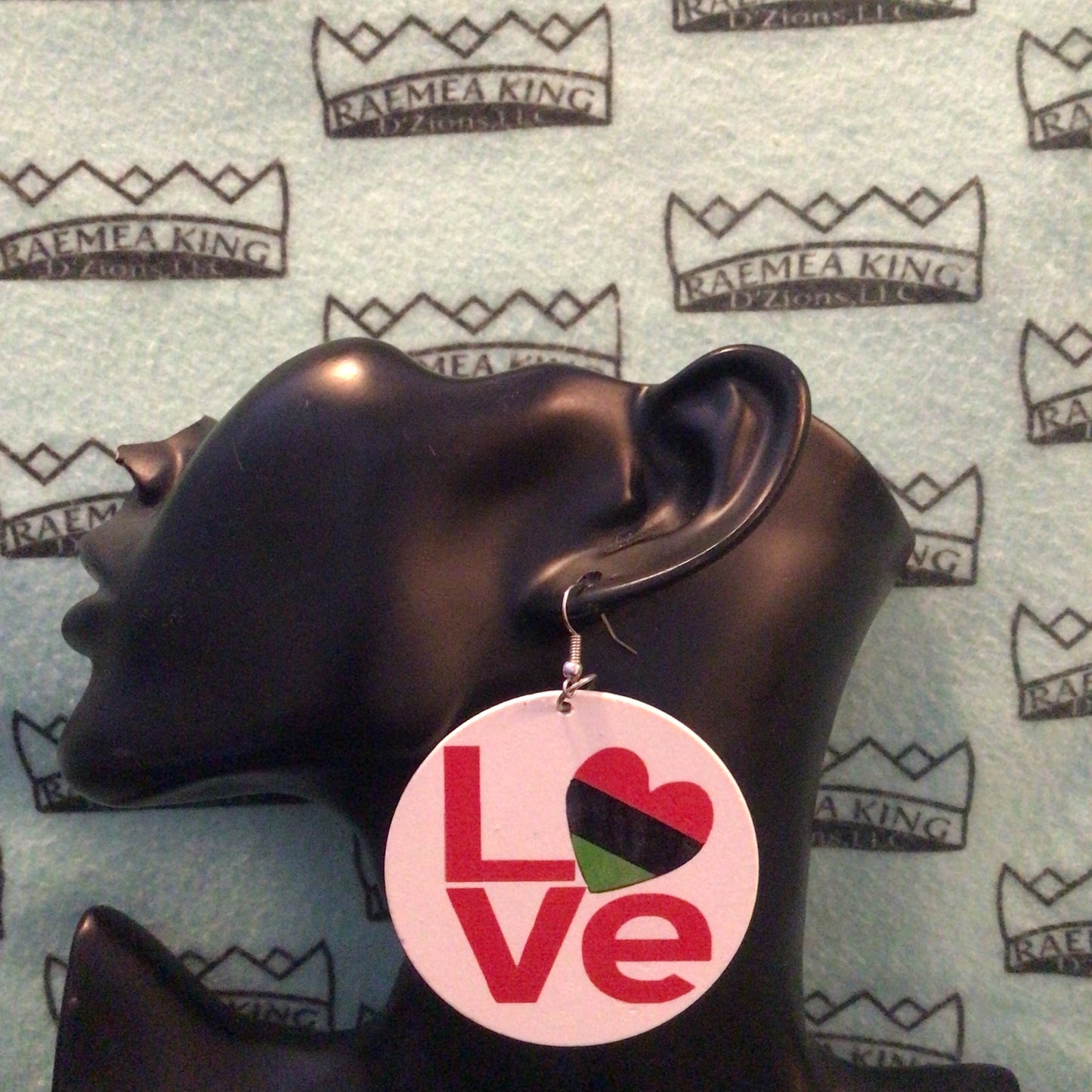 Love with Red, Black & Green Heart as the "O"