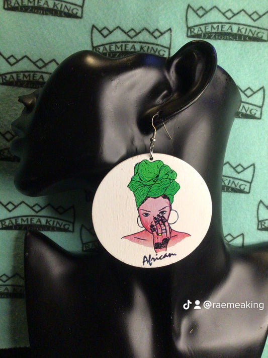 African Lady with Colored Headwrap with Hand to her Face