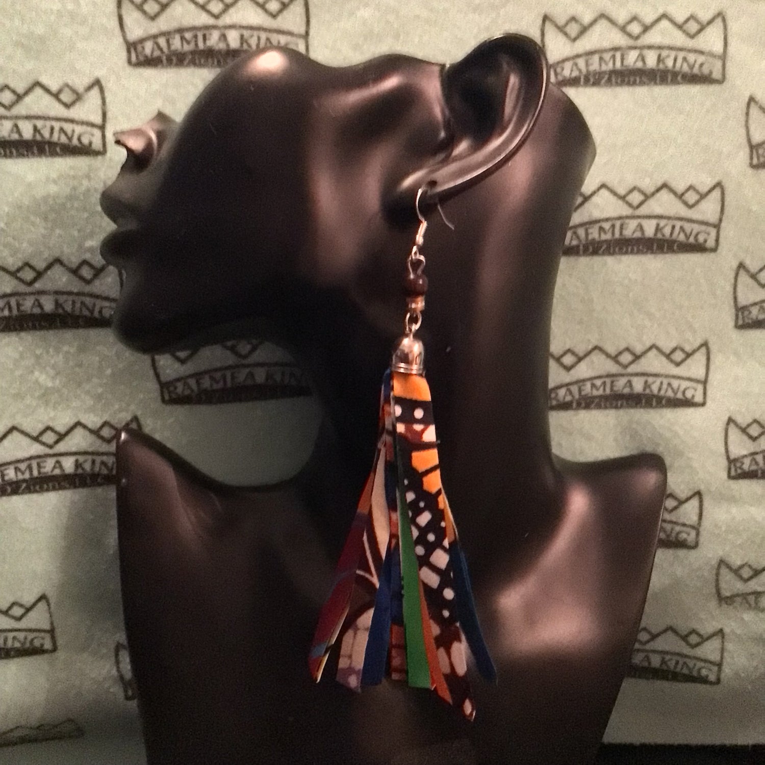 African pattern multi-colored shredded  medium length earrings.