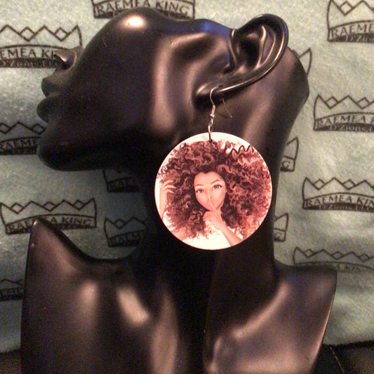 Girl with wavy hair, finger on lips saying hush