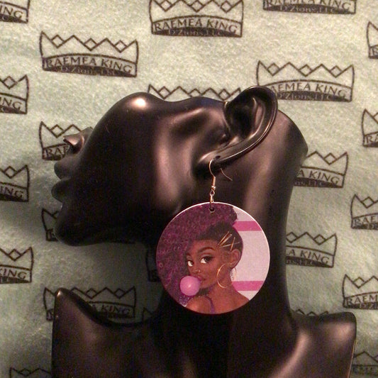 Girl blowing a purple bubble with purple