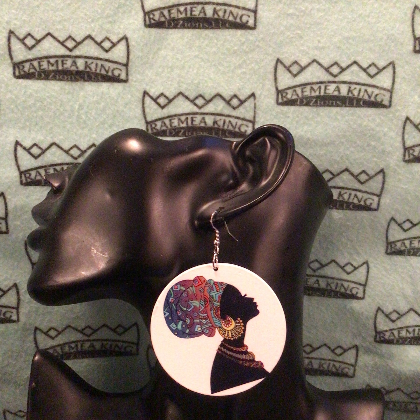 Black Lady with Headwrap and Gold Earring side view