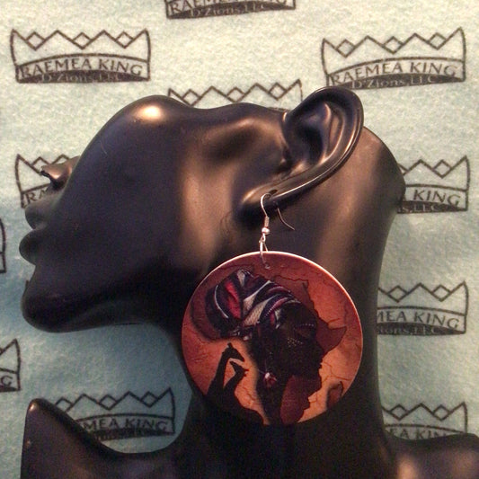 Africa Map with Ladies face in it, with 2 Giraffes